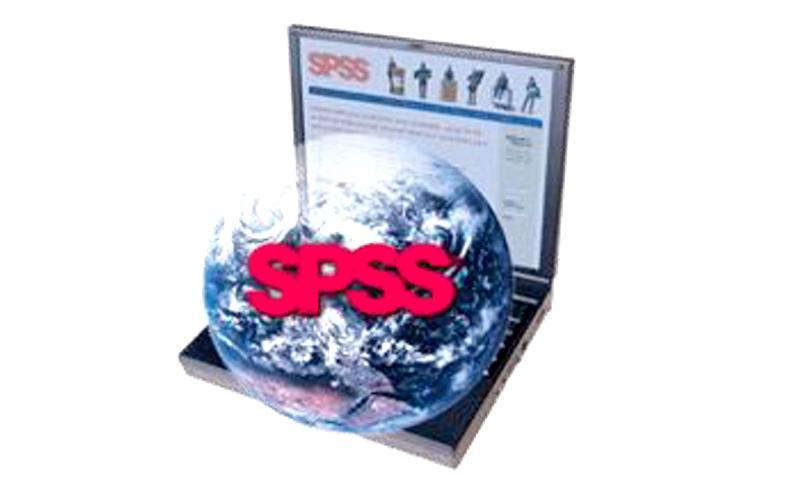 Laptop abierta con globo del mundo y letras SPSS